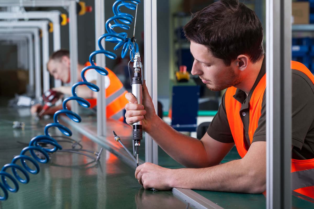 Expert working on industrial equipment